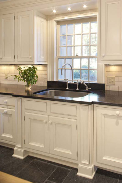 Clean white kitchen with subway tile